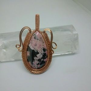 Hand wrapped in Copper a rhodonite pendant